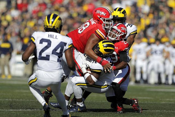 Lavert Hill (24), Daxton Hill (30), and Josh Metellus (14)