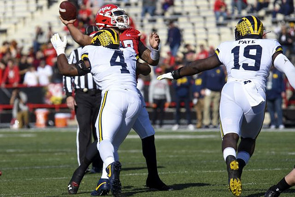 Michael Danna (4) and Kwity Paye (19)