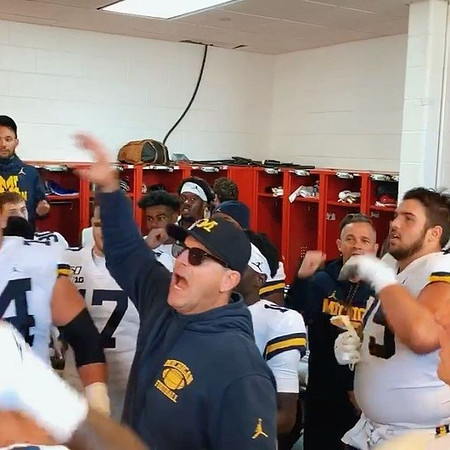 Will Hart (17), Jim Harbaugh, and Jon Runyan Jr. (75)