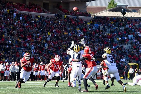 Josh Metellus (14) and Daxton Hill (30)