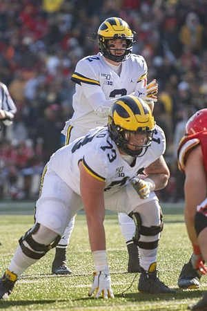 Jalen Mayfield (73) and Shea Patterson (2)