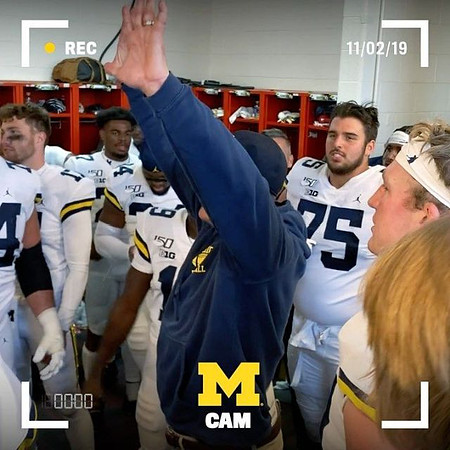 Will Hart (17), Kwity Paye (19), Jon Runyan Jr. (75), and Jim Harbaugh