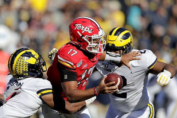 Khaleke Hudson (7) and Carlo Kemp (2)