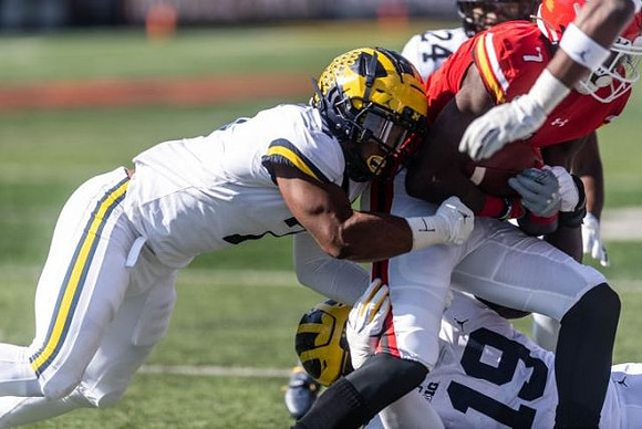 Khaleke Hudson (7), Kwity Paye (19), and Lavert Hill (24)