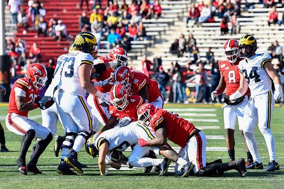 Jalen Mayfield (73), Christian Turner (3), and Sean McKeon (84)