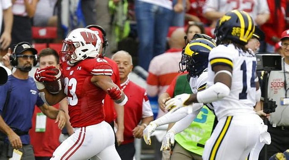 Josh Metellus (14) and Lavert Hill (24)