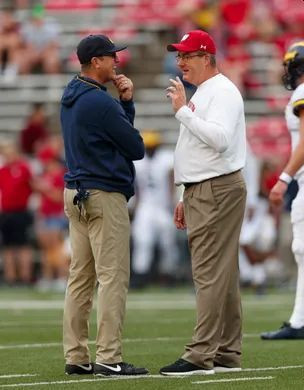 Jim Harbaugh and Wisconsin Head Coach Paul Chryst