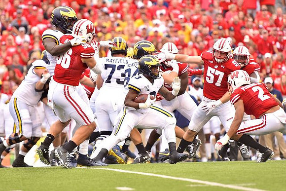 Jalen Mayfield (73) and Christian Turner (3)