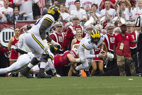 Michael Onwenu (50) and Shea Patterson (2)