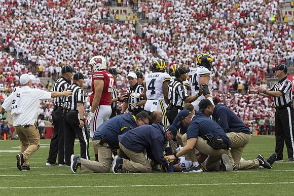 Dylan McCaffrey (10), Nico Collins (4), and Ben Bredeson (74)