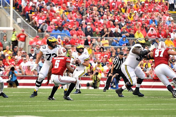 Jalen Mayfield (73), Shea Patterson (2), and Michael Onwenu (50)