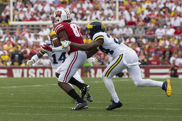 Josh Metellus (14) and Lavert Hill (24)