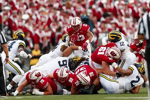 Josh Metellus (14), Josh Ross (12), and Carlo Kemp (2)