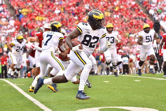 Zach Charbonnet (24), Tarik Black (7), Nick Eubanks (82), Jalen Mayfield (73), and Cesar Ruiz (51)