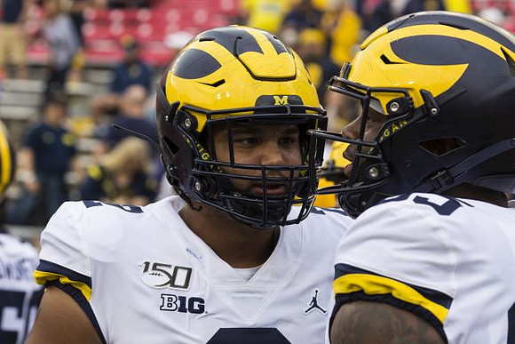 Carlo Kemp (2) and Donovan Jeter (95)