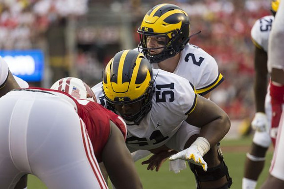 Cesar Ruiz (51) and Shea Patterson (2)