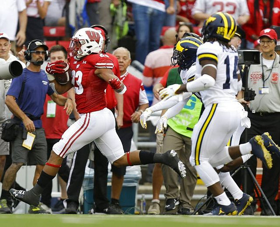 Josh Metellus (14) and Lavert Hill (24)