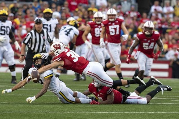 Michael Onwenu (50), Cesar Ruiz (51), Ben Bredeson (74), and Ronnie Bell (8)