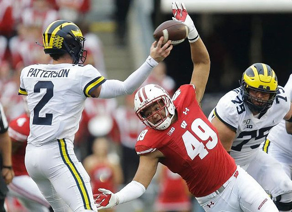 Shea Patterson (2) and Jon Runyan Jr. (75)