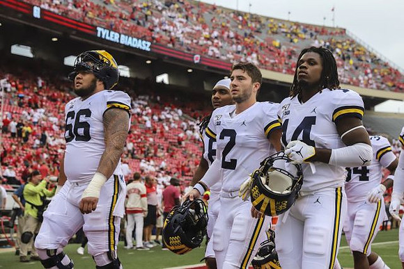 Chuck Filiaga (66), Shea Patterson (2), Josh Metellus (14), and Jordan Anthony (34)