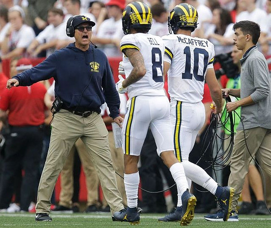 Jim Harbaugh, Ronnie Bell (8), and Dylan McCaffrey (10)