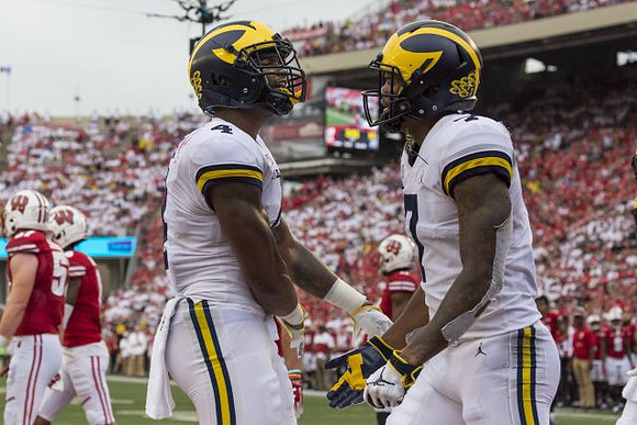 Nico Collins (4) and Tarik Black (7)