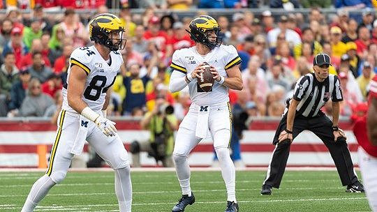 Sean McKeon (84) and Shea Patterson (2)
