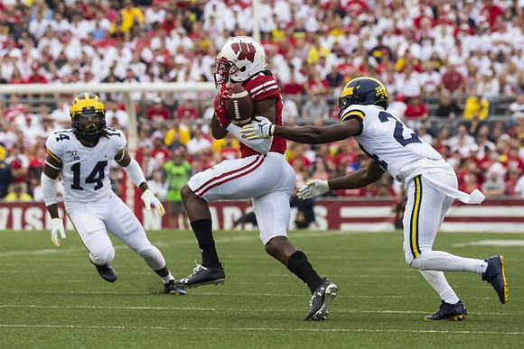 Josh Metellus (14) and Lavert Hill (24)