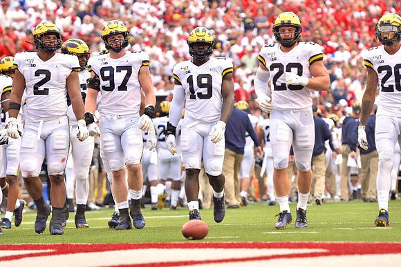 Carlo Kemp (2), Aidan Hutchinson (97), Kwity Paye (19), Jordan Glasgow (29), and J'Marick Woods (26)