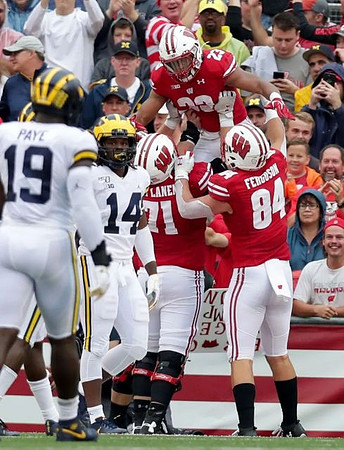 Kwity Paye (19) and Josh Metellus (14)