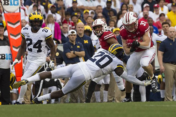 Lavert Hill (24) and Brad Hawkins (20)