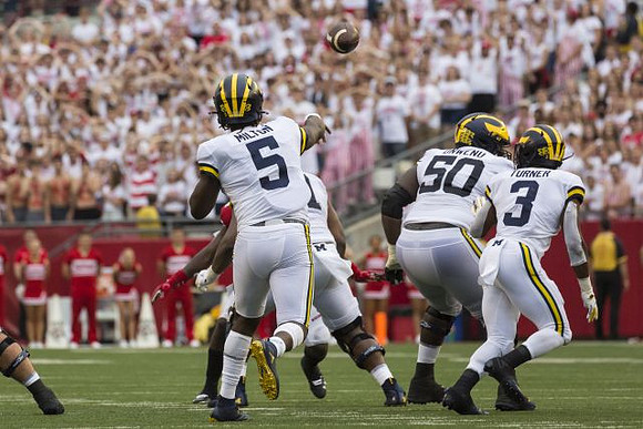 Joe Milton (5), Michael Onwenu (50), and Christian Turner (3)