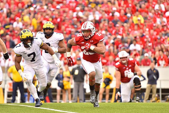 Khaleke Hudson (7) and Carlo Kemp (2)