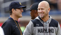Jim Harbaugh and Maryland Interim Head Coach Matt Canada