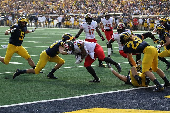 Jared Wangler (5), Jake McCurry (43), Jordan Glasgow (29), and Tru Wilson (13)