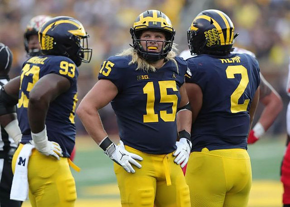 Lawrence Marshall (93), Chase Winovich (15), and Carlo Kemp (2)