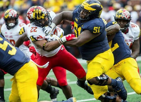 Cesar Ruiz (51) and Karan Higdon (22)