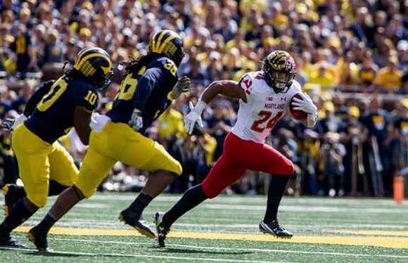 Devin Bush (10) and Devin Gil (36)