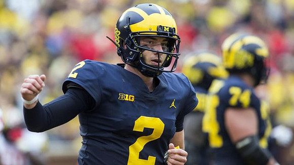 Shea Patterson (2) and Ben Bredeson (74)