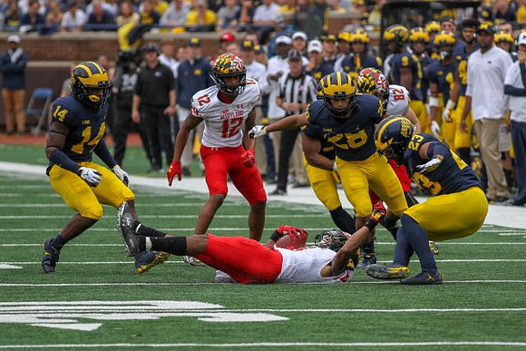 Josh Metellus (14), Brandon Watson (28), and Tyree Kinnel (23)