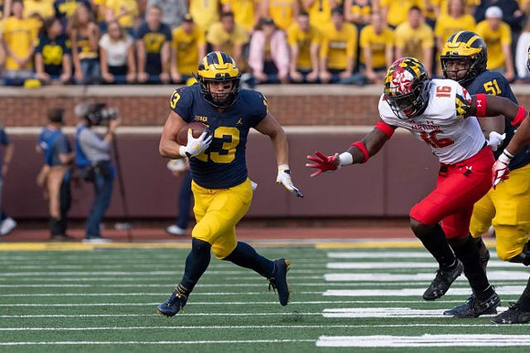 Tru Wilson (13) and Cesar Ruiz (51)