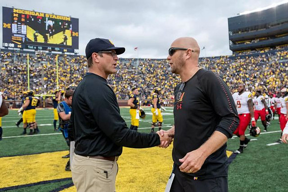 Jim Harbaugh and Maryland Interim Head Coach Matt Canada