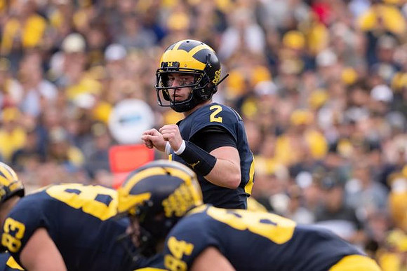 Shea Patterson (2), Zach Gentry (83), and Sean McKeon (84)