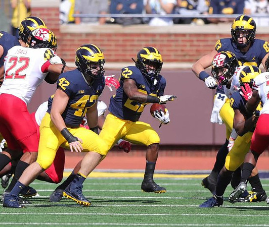 Ben Mason (42), Karan Higdon (22), Zach Gentry (83), and Donovan Peoples-Jones (9)