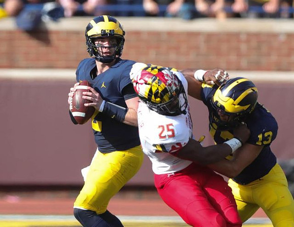 Shea Patterson (2) and Tru Wilson (13)