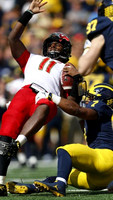 Khaleke Hudson (7) and Aidan Hutchinson (97)