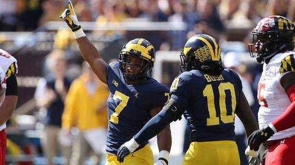 Khaleke Hudson (7) and Devin Bush (10)