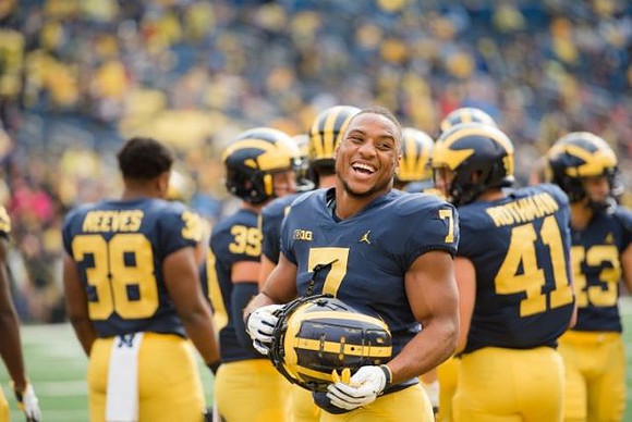 Geoffrey Reeves (38), Khaleke Hudson (7), and Quinn Rothman (41)