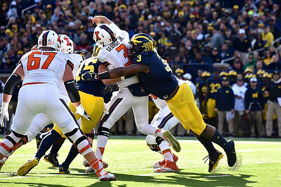 Chase Winovich (15) and Rashan Gary (3)
