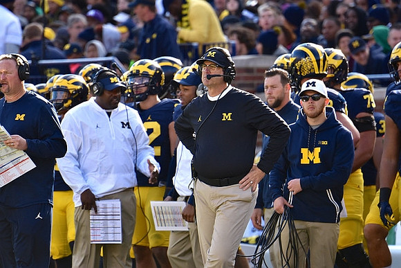 Tim Drevno, Tyrone Wheatley Sr., and Jim Harbaugh